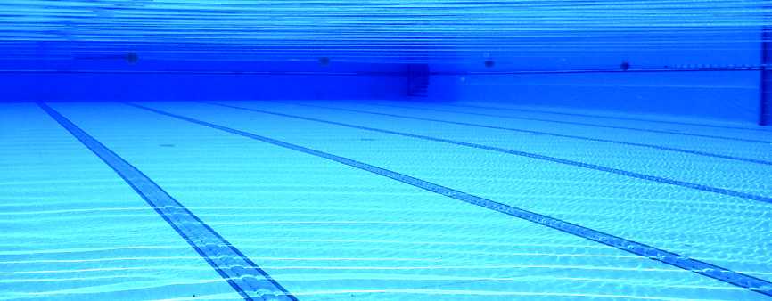 Underwater photo of a swimming pool.